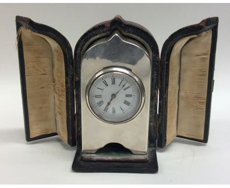 An attractive cased silver carriage clock. Birmingham. By DCC. Approx. 9 cms high. Est. £300 - £400.