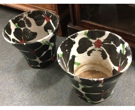 JANICE TCHALENKO (British: 1942 - 2018): A matched pair of large 'Black Rose' design Dartington planters of tapering form. Ap