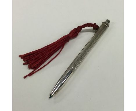 A novelty silver engine turned pen. Birmingham. Approx. 9 grams. Est. £10 - £20.