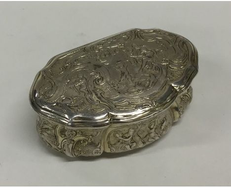 An 18th Century French silver gilt snuff box decorated with figures in relief. Approx. 90 grams. Est. £250 - £350.