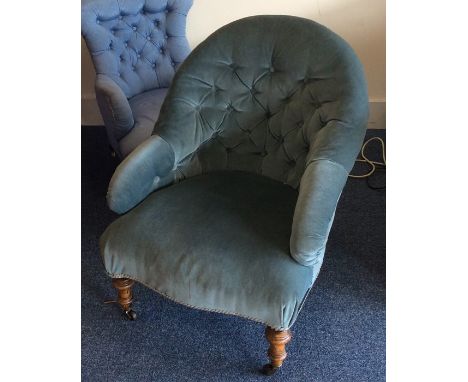 A Victorian button back armchair. Est. £20 - £30.