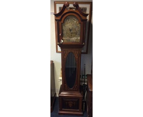 A fine Edwardian inlaid mahogany cased nine tubukar chiming longcase clock, the brass arched dial with chased filigree panels