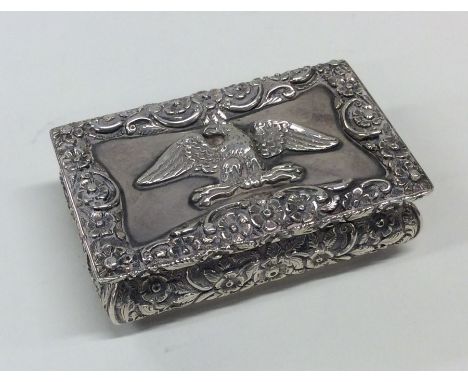 A good quality Georgian silver rectangular hinged top snuff box crisply decorated with flowers and leaves to gilt interior. B