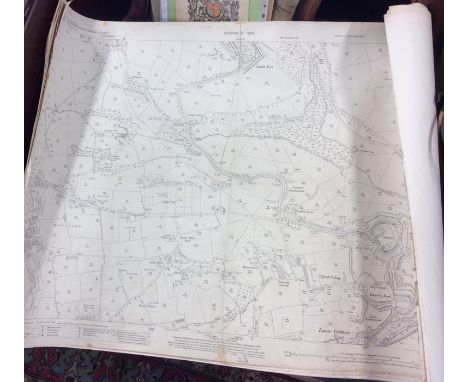 A roll of old Devon ordnance survey maps dated 1914. Est. £30 - £50.