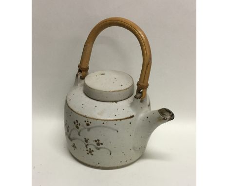 DAVID LEACH (British: 1911 - 2005): A small Lowerdown stoneware pottery teapot on flat base of squat form with dot and brush 