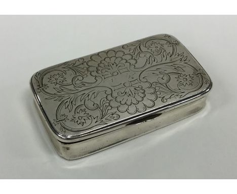 A 19th Century French engraved silver snuff box with gilt interior. Approx. 99 grams. Est. £150 - £200.