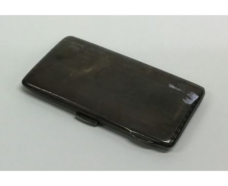 A silver engine turned card holder with hinged mount. Birmingham. By HM. Approx. 76 grams. Est. £60 - £80.