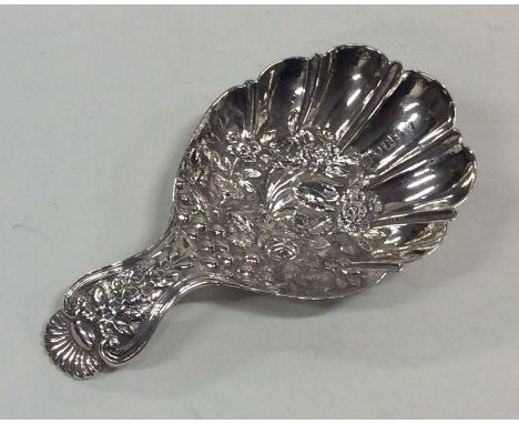 A rare chased silver caddy spoon attractively decorated with flowers and leaves. Birmingham 1840. By Joseph Wilmore. Approx. 