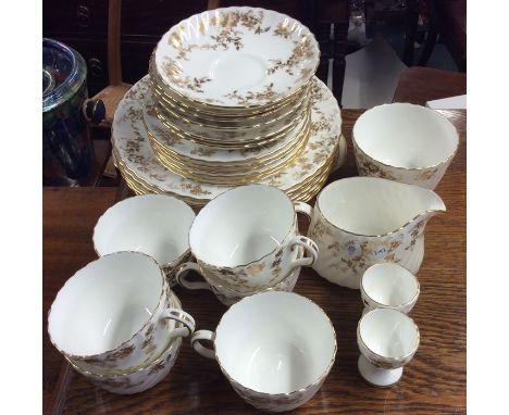 A Minton 'Gold Ancestral' pattern part tea service. Est. £30 - £40.