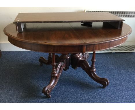 A large mahogany circular loo table to pillar base together with extra leaf. Est. £60 - £80.