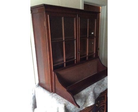 A Georgian mahogany bookcase with matching wall bracket. Est. £100 - £200.