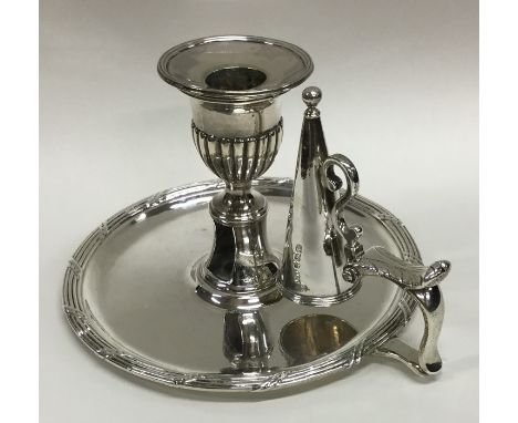 A good heavy George III silver chamber stick with matching snuffer. London 1806. By William Stroud. Approx. 410 grams. Est. £