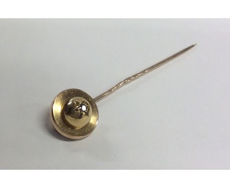 A 14 carat gold diamond stick pin. Approx. 5 grams. Est. £80 - £90.