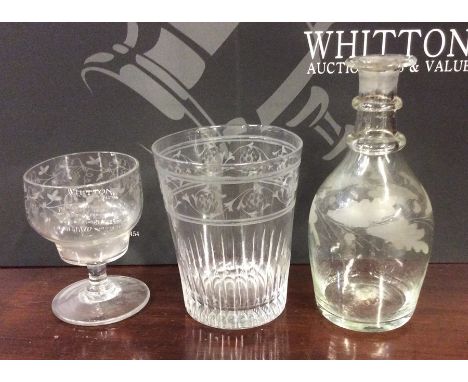 A Georgian tapering gin and tonic / lemonade glass with etched scroll decoration. Approx. 11 cms high. Est. £25 - £35.