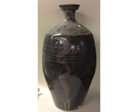 DAVID LEACH (British: 1911 - 2005): A massive 1970s baluster shaped stoneware pottery shoulder vase with flared neck in charc