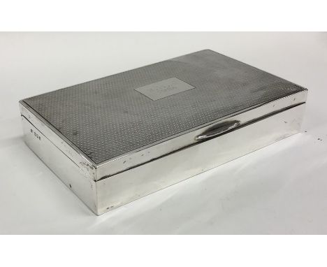 A good engine turned rectangular silver cigarette case. London 1904. Approx. 310 grams. Est. £80 - £120.