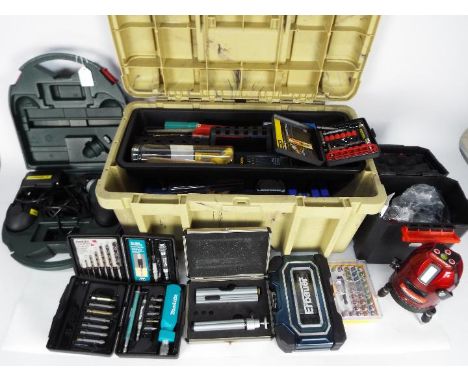Mixed tools to include a laser level, Metabo Power Grip cordless screwdriver and similar. [3]Condition Report: Total weight a