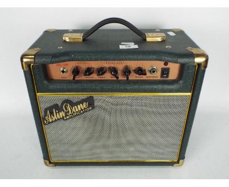 Aslin Dane Amp - a Aslin Dane Amplificatio, Model Number AG - 15R, finished in racing green  with gold coloured detailing 