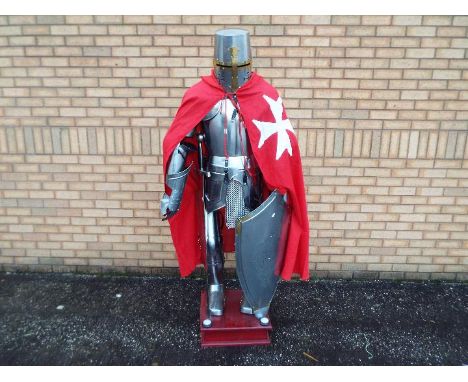 Life size model of a medieval knight's armour, fixed to wooden plinth, approximately 185 cm (h)