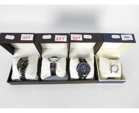Fashion Watches - Four fashion watches to include a Tommy Hilfiger with white rubber strap with tags Model # 1781549 and thre