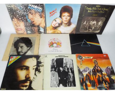 A collection of 12" vinyl records to include Pink Floyd, Queen, Bob Dylan, The Rolling Stones, David Bowie, Cat Stevens and o