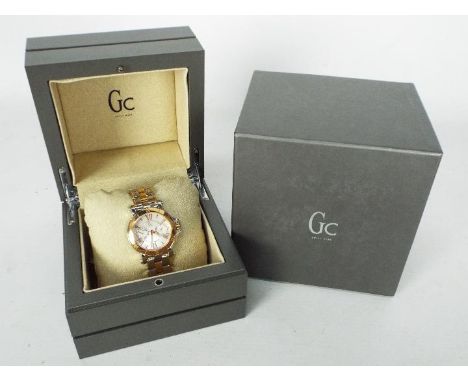Gc Watch - a Gc Analogue wristwatch with rose gold coloured / Ion-plated strap, mother of pearl dial, date & day subsidiary d