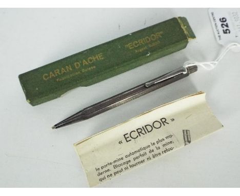 Caran d'Ache - A vintage Ecridor white metal propelling pencil .800 fineness, contained in original box with instructions lea