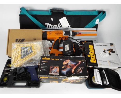 Mixed tools to include a Triton palm planer, Triton drill, router track adapter and other. [2]