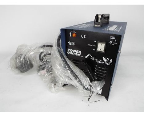 Power Craft - A 160 amp arc welder, model number BX1-160B2, appears unused.