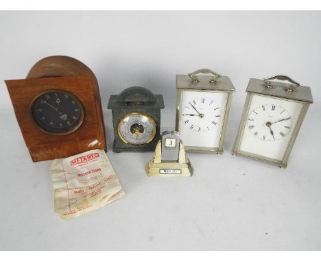 A Selection of clocks to include a Smiths (for restoration) and two Metamec clocks, together with a hand made green slate Bar