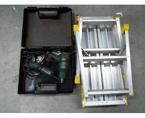 A Youngman folding step stool, a Bosch heat gun, model PHG500-2 and a Bosch scraper, model PSE180E. [2]
