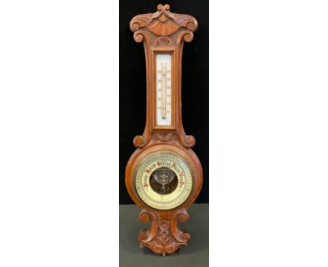 An oak barometer, mercury thermometer, 58cm long 