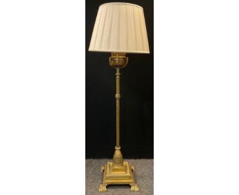 A Victorian oil-burner brass standard lamp, converted for use with electricity, 137cm tall (167cm tall with shade). 