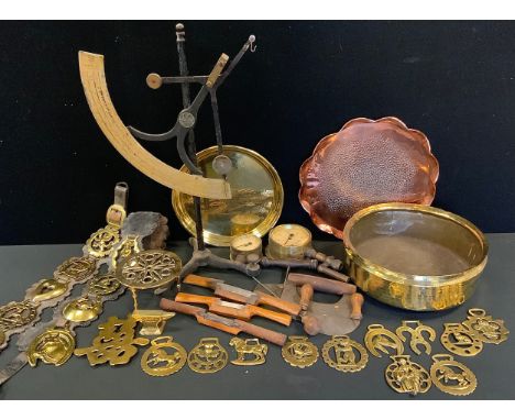 A set of balance scales by H. E. Messmer ltd. London;  vintage pressure gauge's;  horse brasses;  trivets;  brass and copper 
