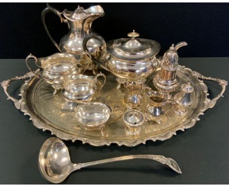 Silver Plate - a four piece boat shaped tea service;  a two handled tray;  a caster;  ladle;  jugs';  etc 