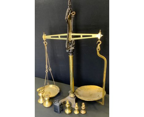 A 19th century Parnall &amp; sons of Bristol, cast iron and brass grocers balance scale, 87.5cm high;  brass bell weights etc