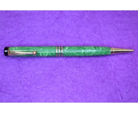 A Parker propelling pencil in jade green. Approx 12.5cm