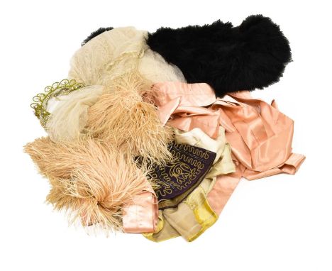 Assorted Early 20th Century Costume Accessories, comprising a black velvet smoking cap with floral embroidery, an Eastern pur