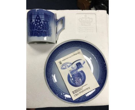 ELEVEN BOXED ROYAL COPENHAGEN CHRISTMAS CUPS AND SAUCERS