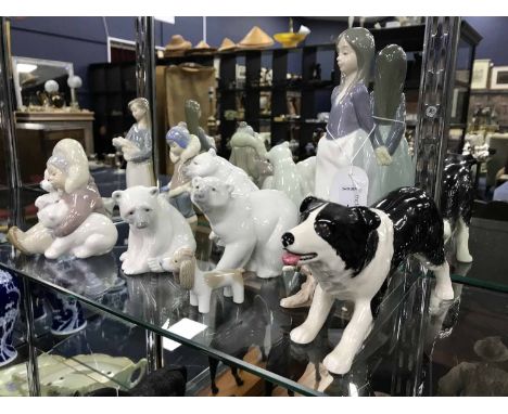 LOT OF LLADRO FIGURESalong with a Goebel robbin, and a ceramic dog