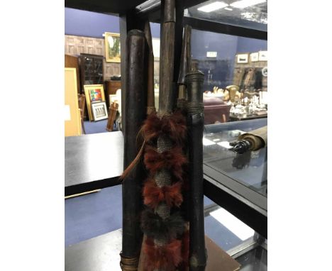 FOUR EARLY 20TH CENTURY MAASAI MARA SPEARS AND TWO JOUSTING STICKS along with an arrow 