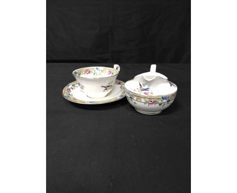 DUCHESS CHINA TEA SERVICEcomprising 8 cups, 11 saucers, 12 side plates, 2 cake plates, milk jug and sugar bowl