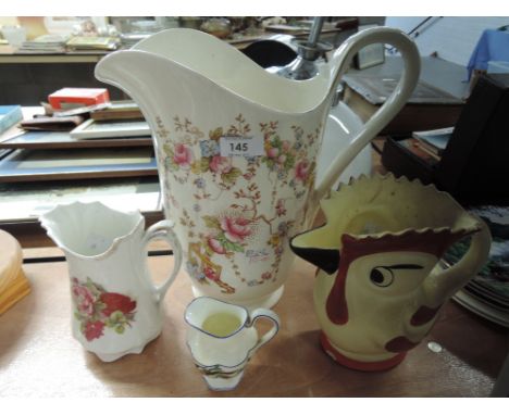 A selection of ceramic jugs including Crown Devon