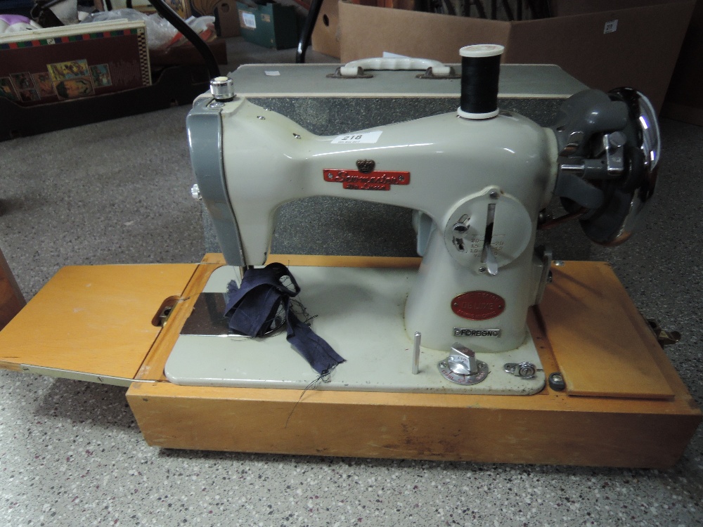 A Sewmaster Delux electric sewing machine