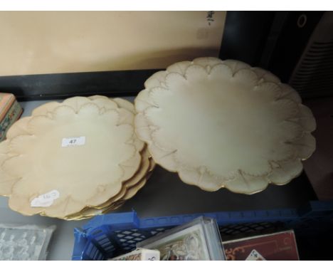 A 19th century Worcester part fruit service comprising tazza and plates on blush ivory ground, number 1349