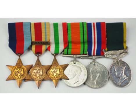 Großbritannien: Große Ordenschnalle eines Veteranen des 2. Weltkrieges.1.) 1939-45 Stern, 2.) Afrika Stern, mit Spange 1st Ar