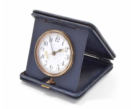 Swiss travelling alarm clock within a blue folding case, 4.25" wide