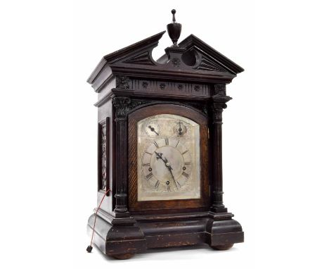 Oak three train boardroom clock, the movement playing and striking on five gongs, the 7" silvered engraved dial with slow/fas