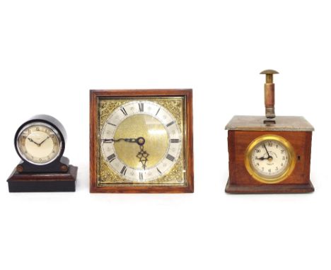 The National Time Recorder Co Limited clock, the 3.5" cream dial within an oak case surmounted by a hand punch, 12" high over