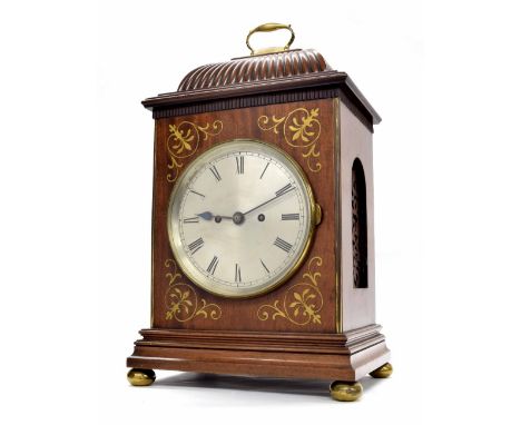 Mahogany double fusee bracket clock striking on a large gong, the 7" silvered dial within a stepped case inlaid with foliate 